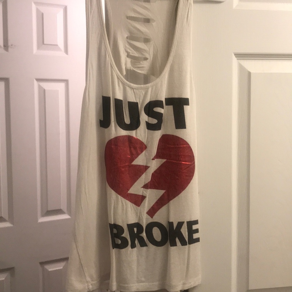 Never worn, but a few faint spots on side. See pic